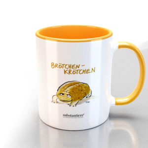 Tasse außen weis, bedruckt mit dem „Brötchen-Krötchen“, innen gelb